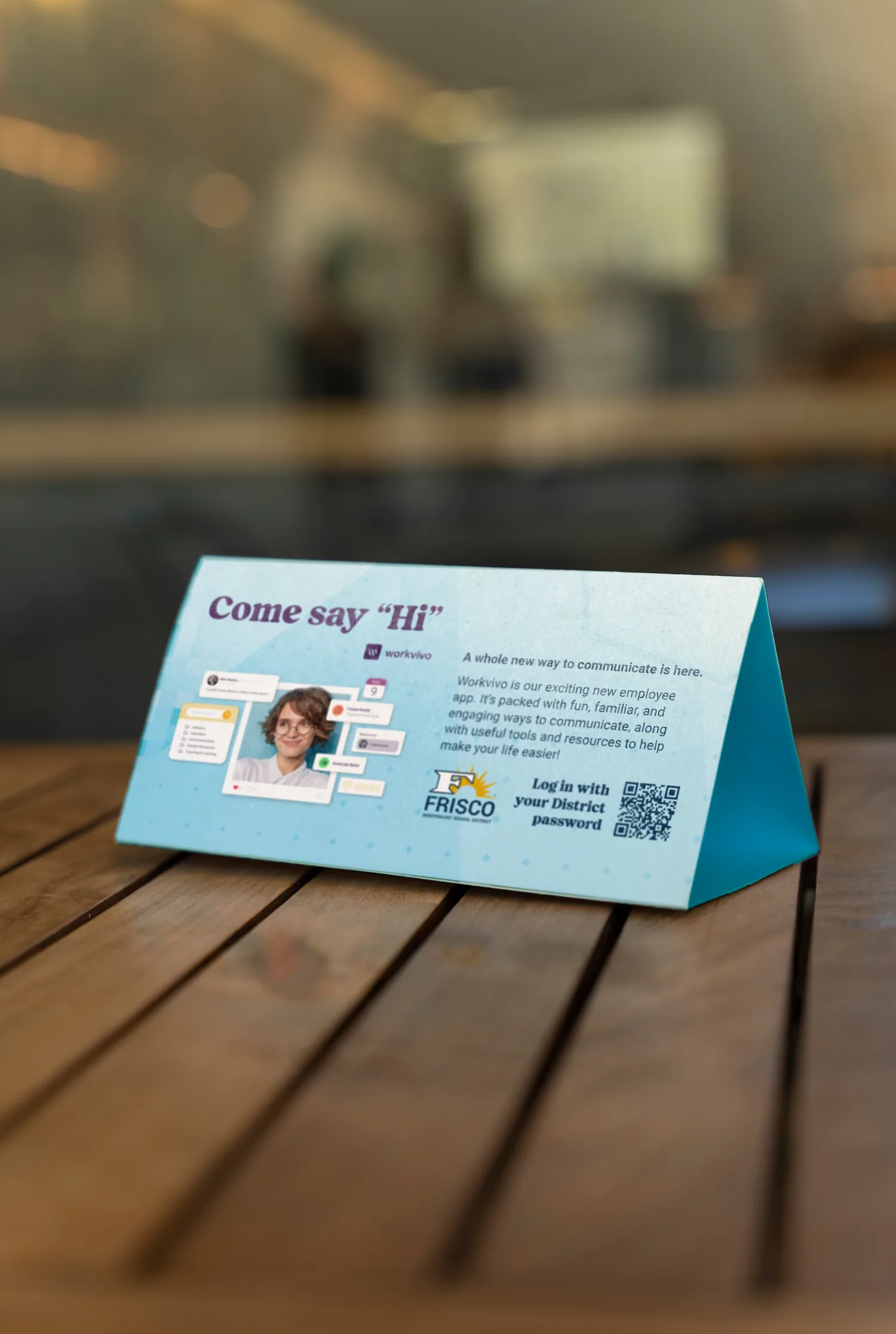 Workvivo tabletop sign inviting employees to say hi